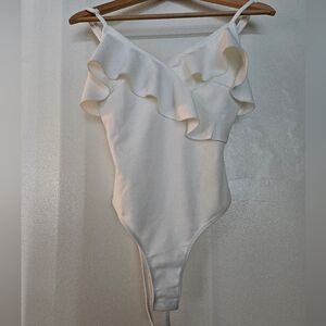 One piece white ruffled tank